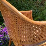 Mc Guire style armchair in rattan and caning from the 1980s.