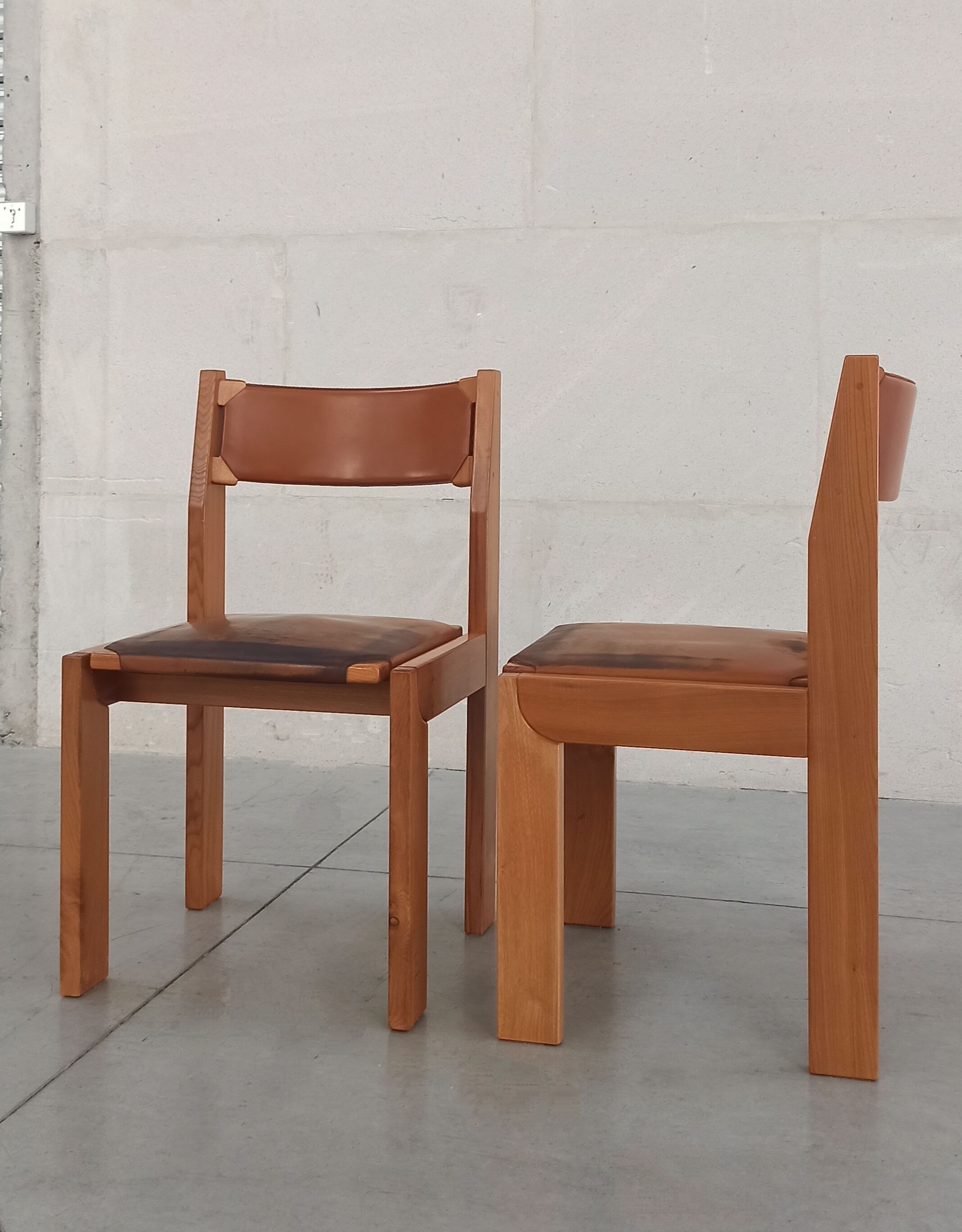 Elm and leather chairs, 80
