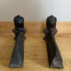 Pair of cast iron andirons from the 19th century, busts of women
