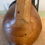 Stoneware pitcher signed Pierre Digan
