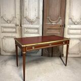 Louis XVI style flat desk in mahogany from around 1950.