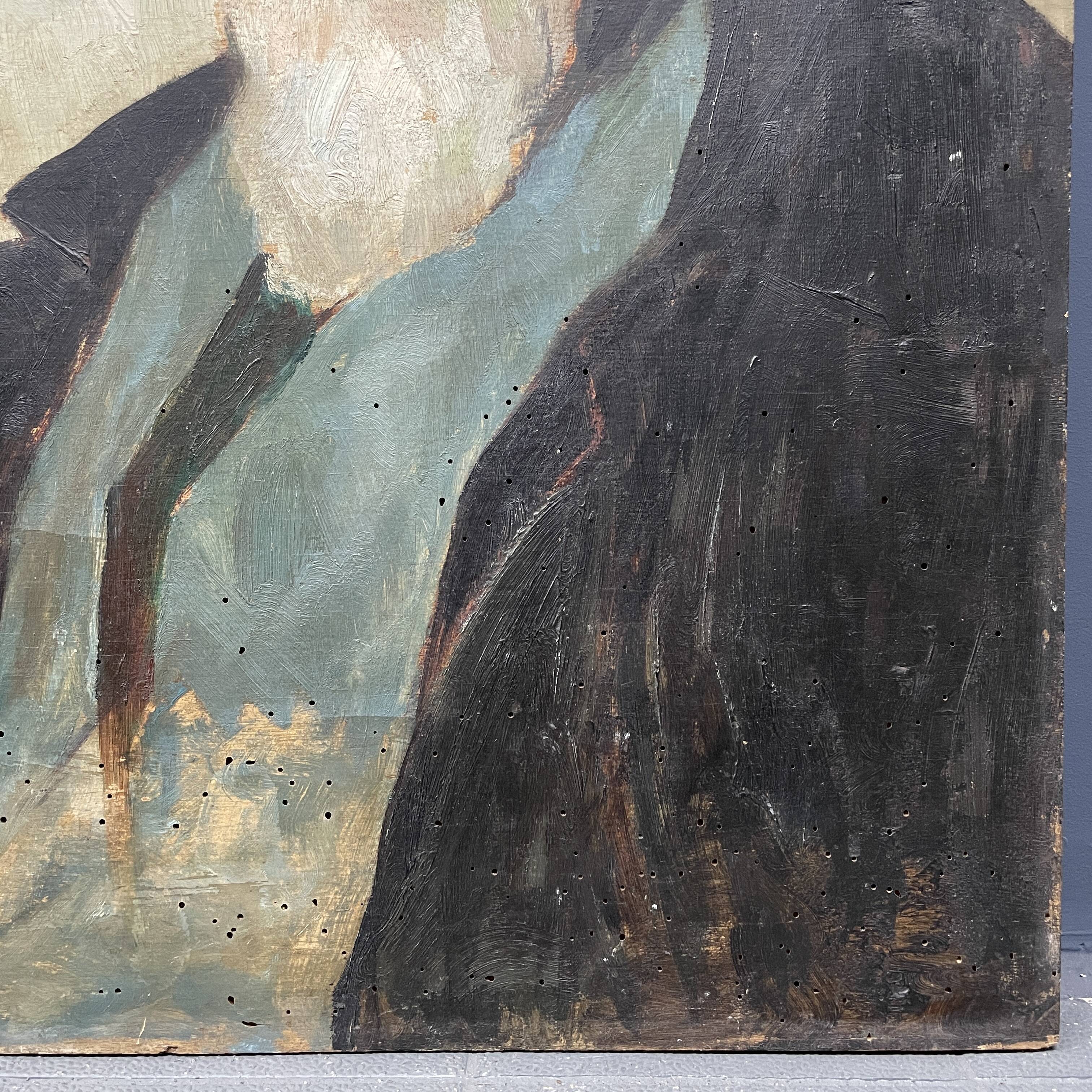 Old portrait of man painted on wooden panel