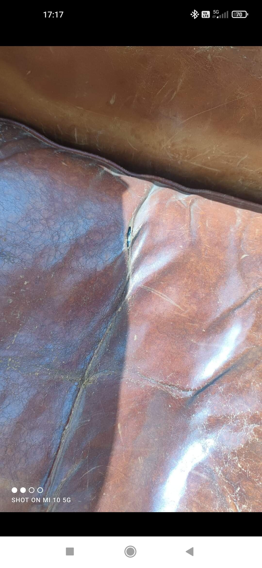 Pair of club chairs with moustache-shaped handles in Havana leather, in their original condition, circa 1930