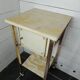 Bedside table in patinated iron, brass and marble tops