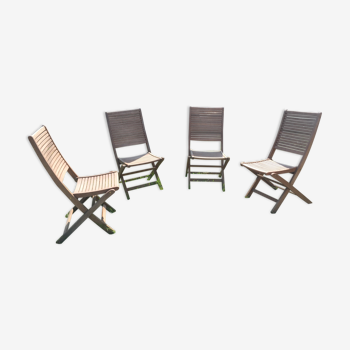 Four teak chairs