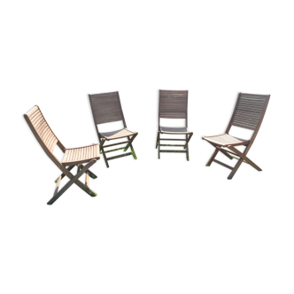 Four teak chairs