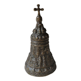 Old religious bell in decorative bronze