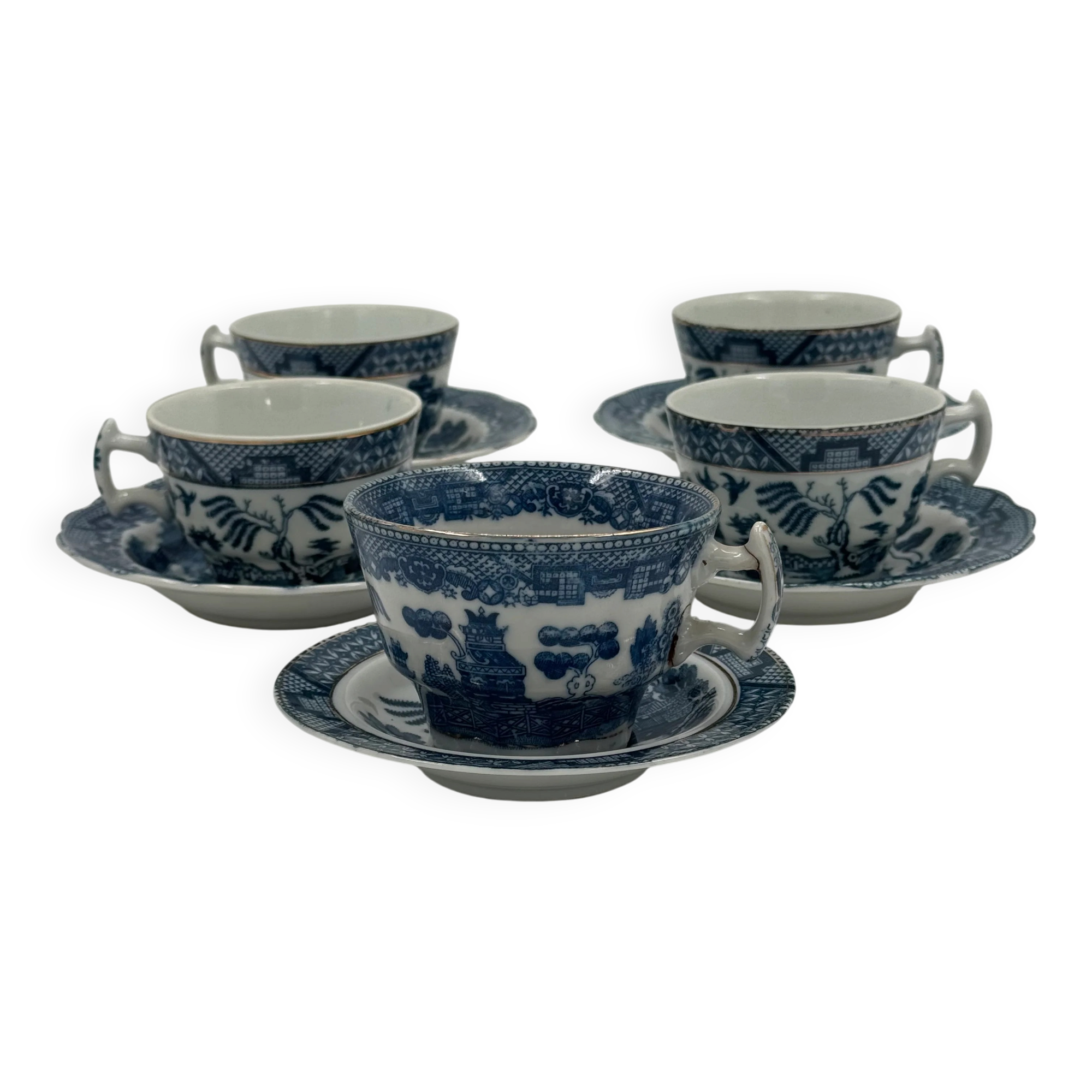 Set of 5 vintage porcelain cups and saucers with Blue Willow pattern.