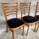 Set of 4 vintage wooden chairs with faux leather.