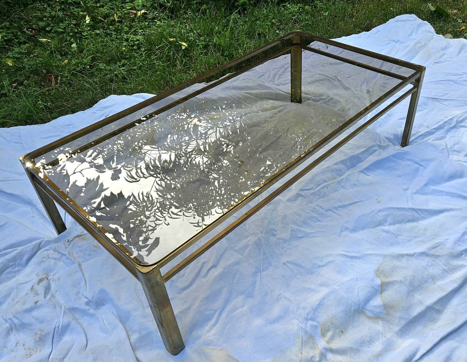 Broncz coffee table brass smoked glass