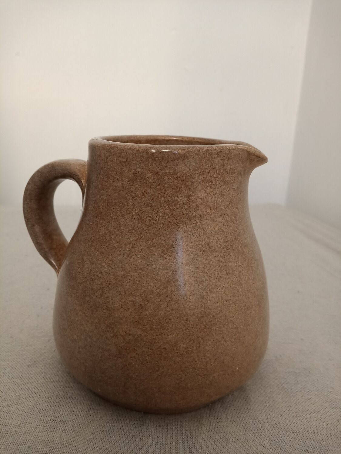 Signed stoneware milk jug