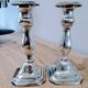 Pair of silver metal candle holders