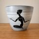 Milet cache-pot Sèvres, hand-decorated with a kneeling woman, 1950s.