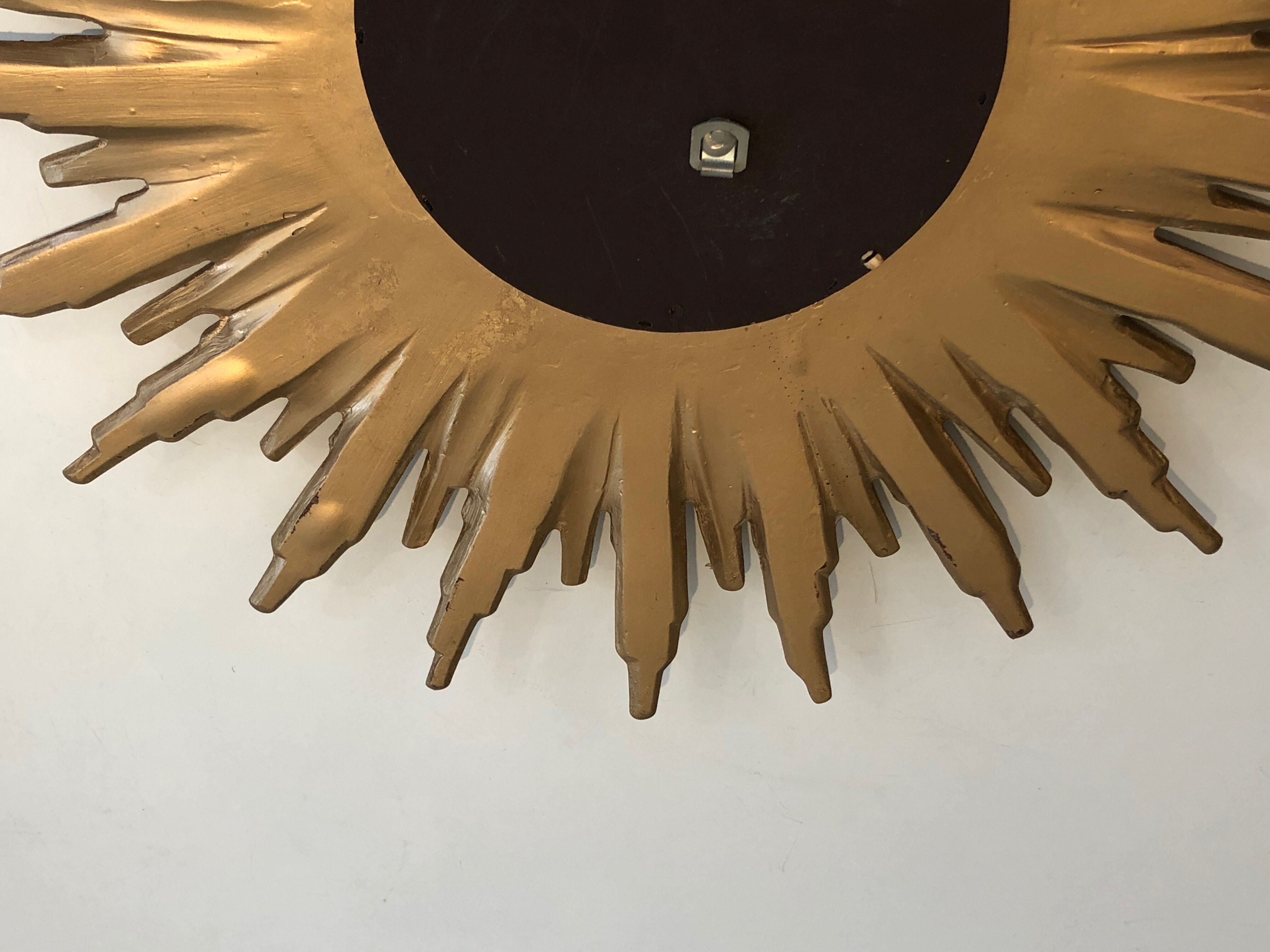 Sun mirror in golden resin 50cm