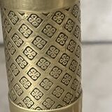 Pair of chiselled brass candlesticks from the 19th century.