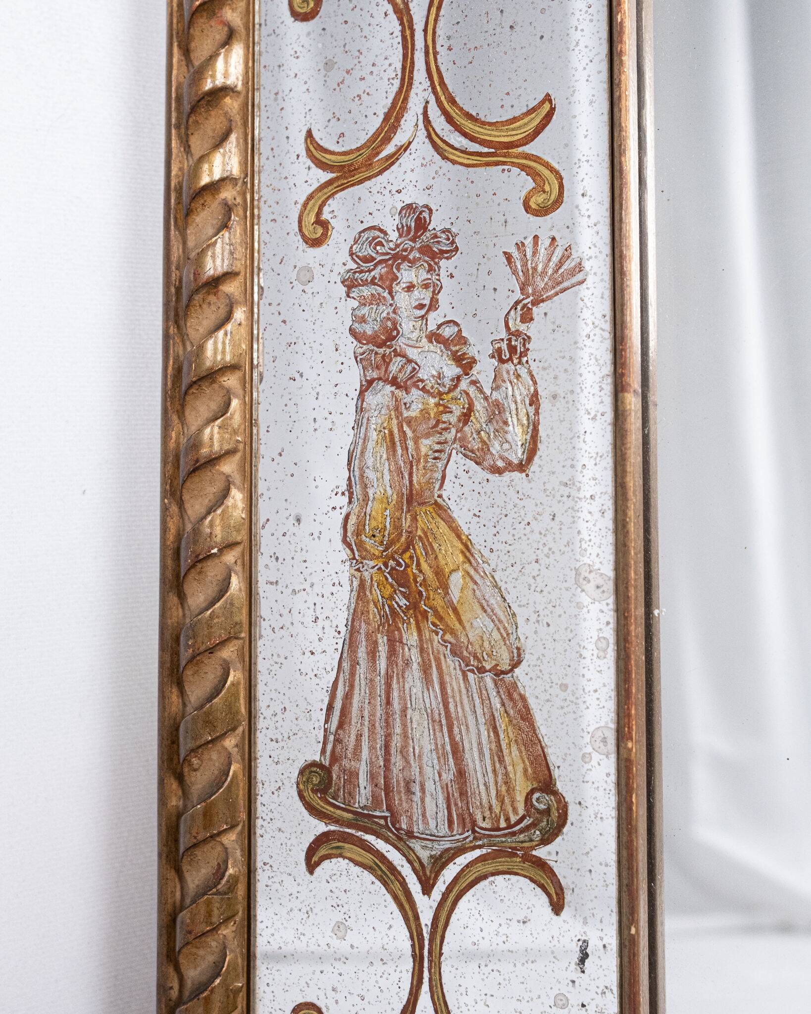 Miroir italien en verre églomisé, à parecloses, début XXe siècle
