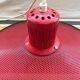 Old design metal perforated suspension in red