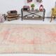 Tapis vintage rouge pâle et beige