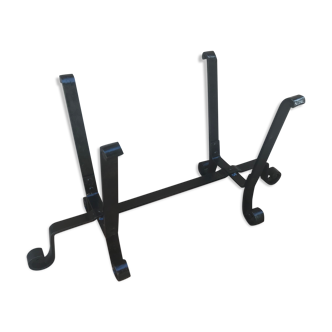 Ancient cast iron log carrier
