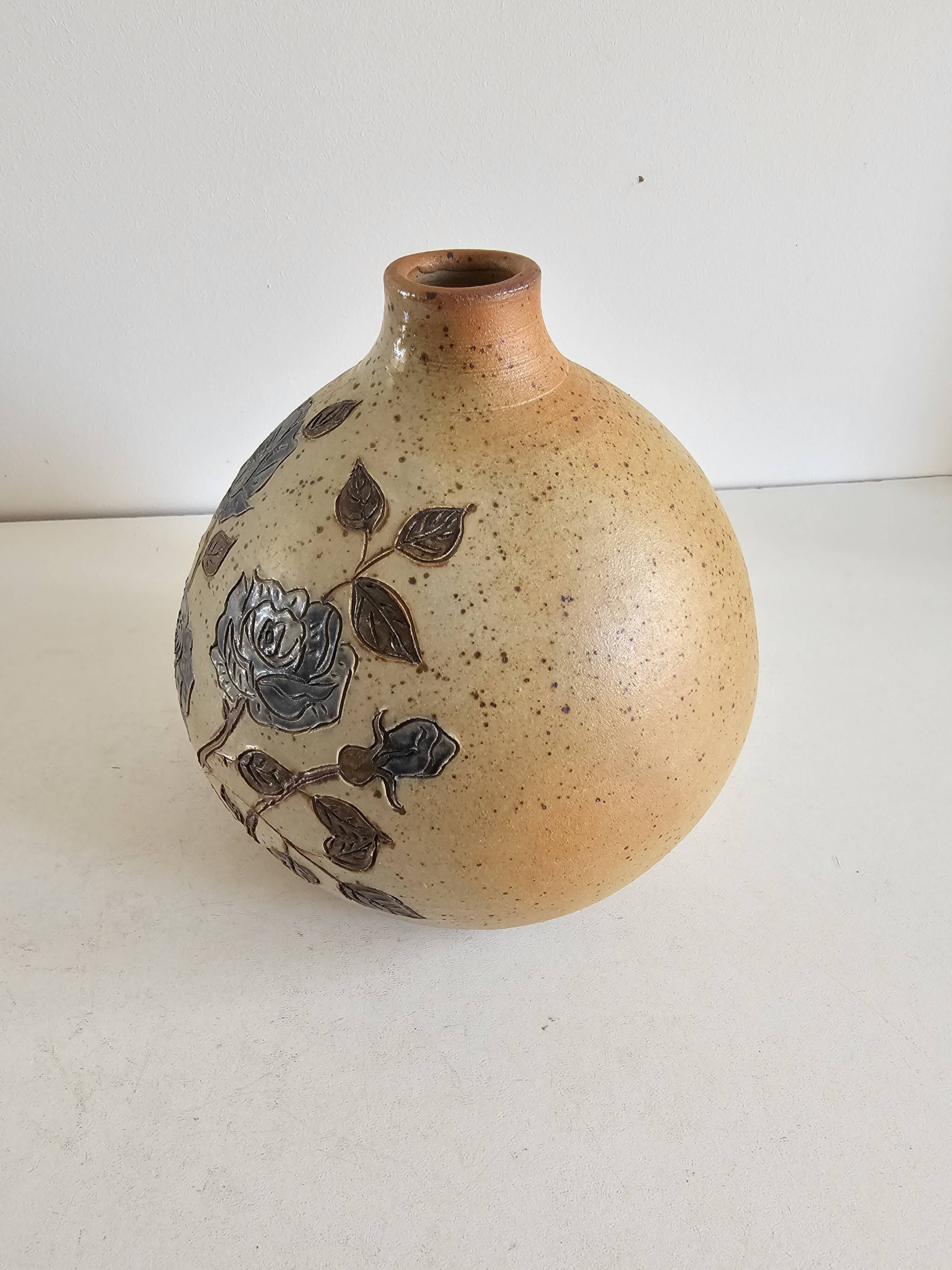 Ceramic lamp base with floral pattern, signed.