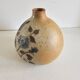 Ceramic lamp base with floral pattern, signed.