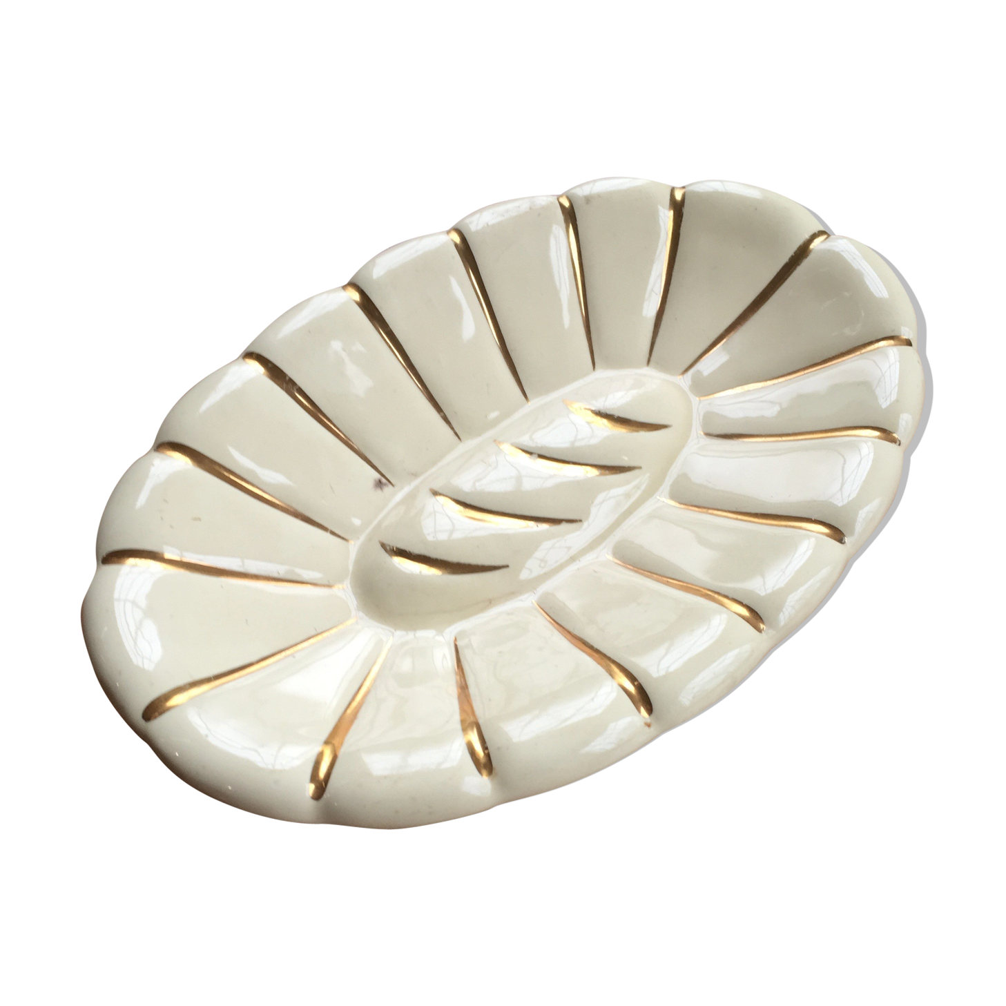 White and gold ceramic plate