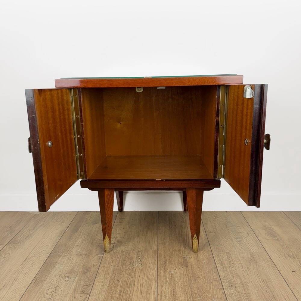 1950s bedside table in varnished wood veneer and brass.