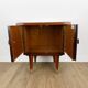 1950s bedside table in varnished wood veneer and brass.