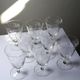 8 engraved crystal wine glasses with a floral design, Bohemia, early 20th century.