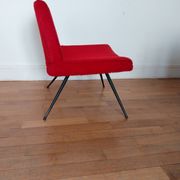 Vintage red faux fur armchair with black metal legs.