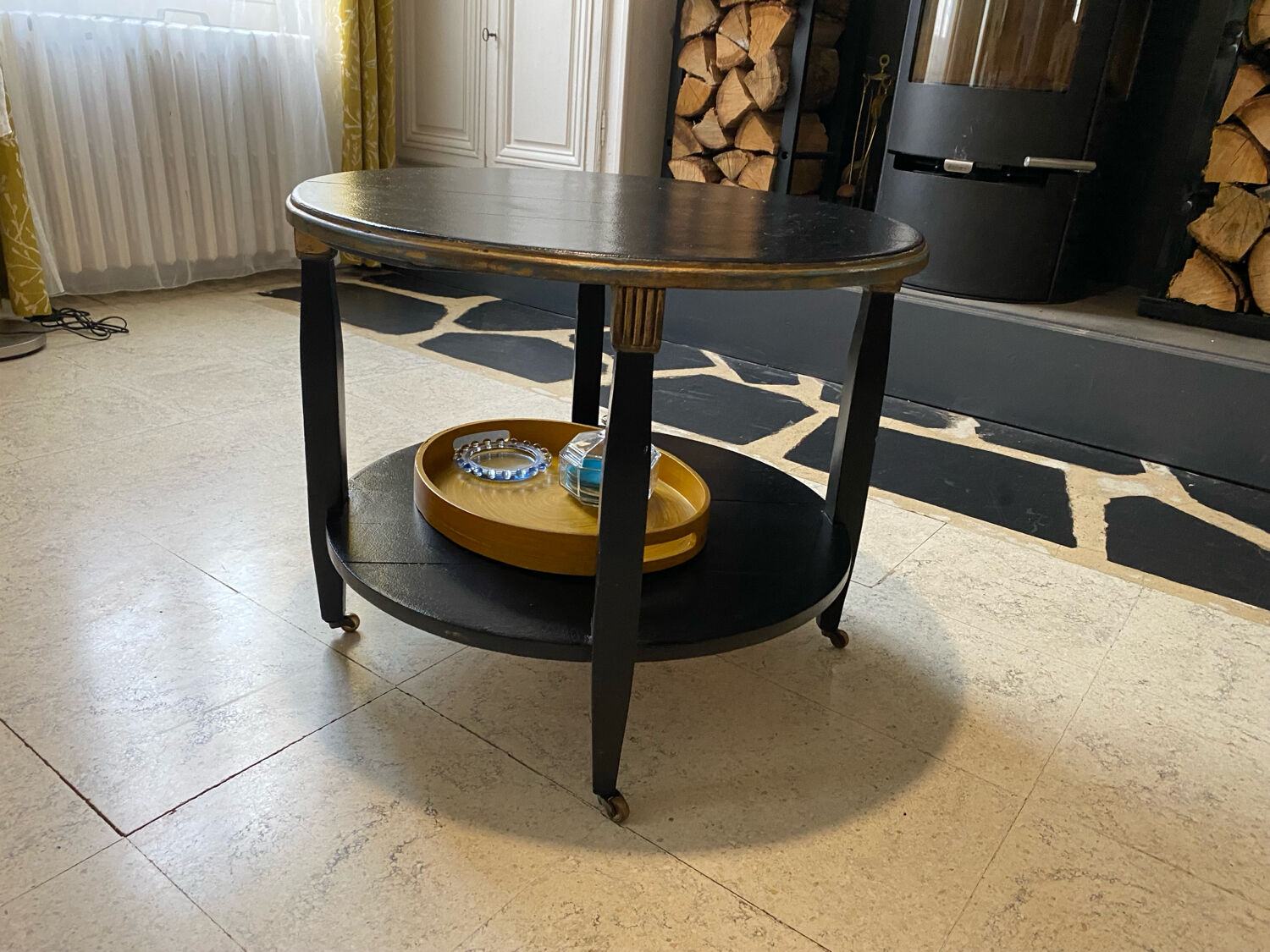 Round wooden coffee table, antique, double top, 4 legs.