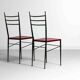 Fine set of metal dining chairs with red leather seating, Italy 1970s