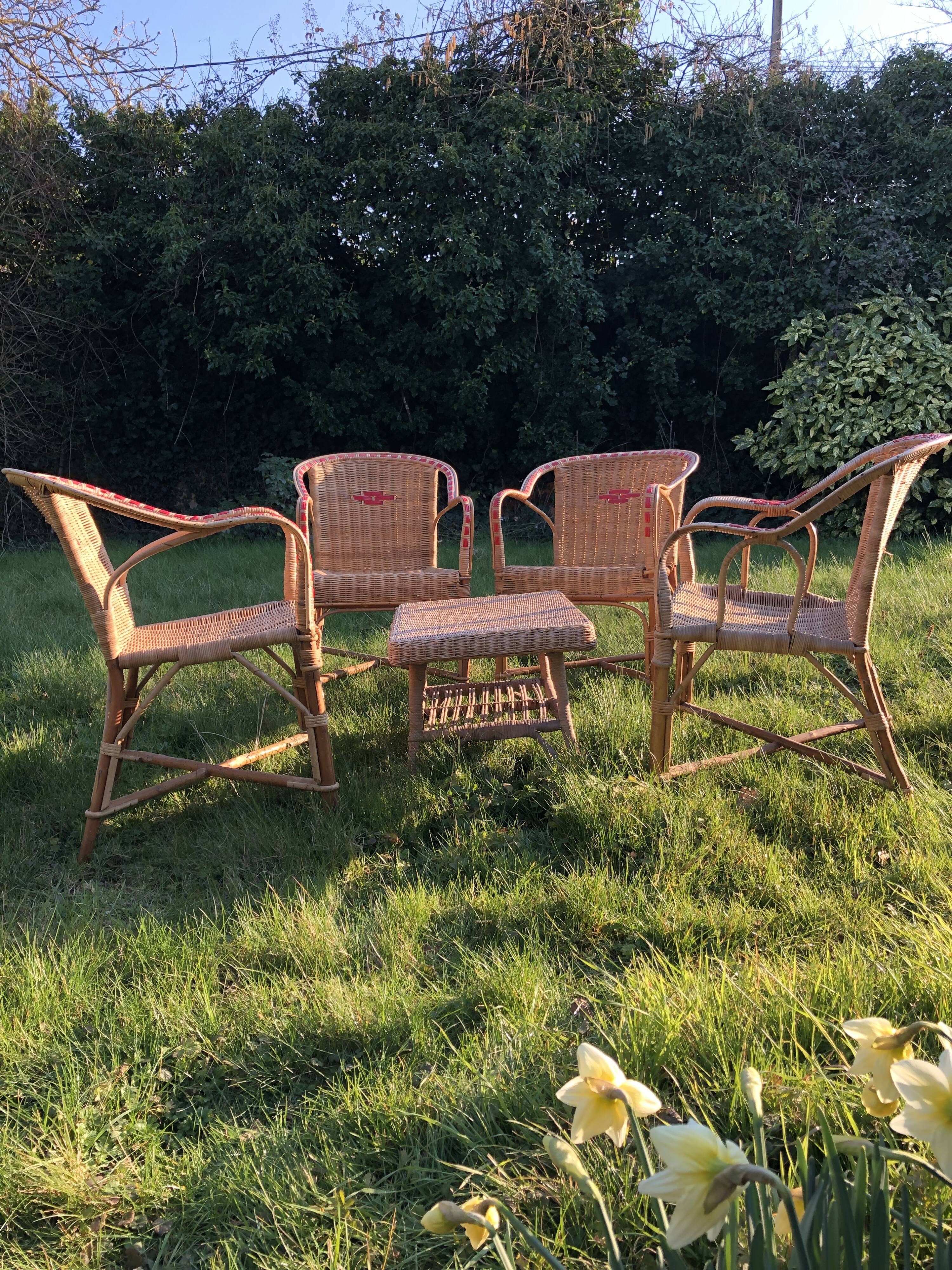 Rattan garden armchairs and coffee table