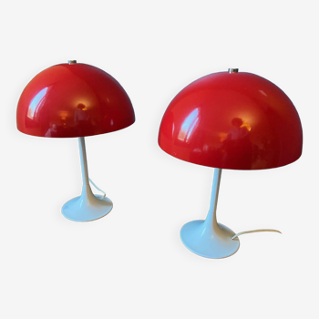 Pair of red metal lamps