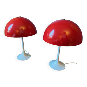 Pair of red metal lamps