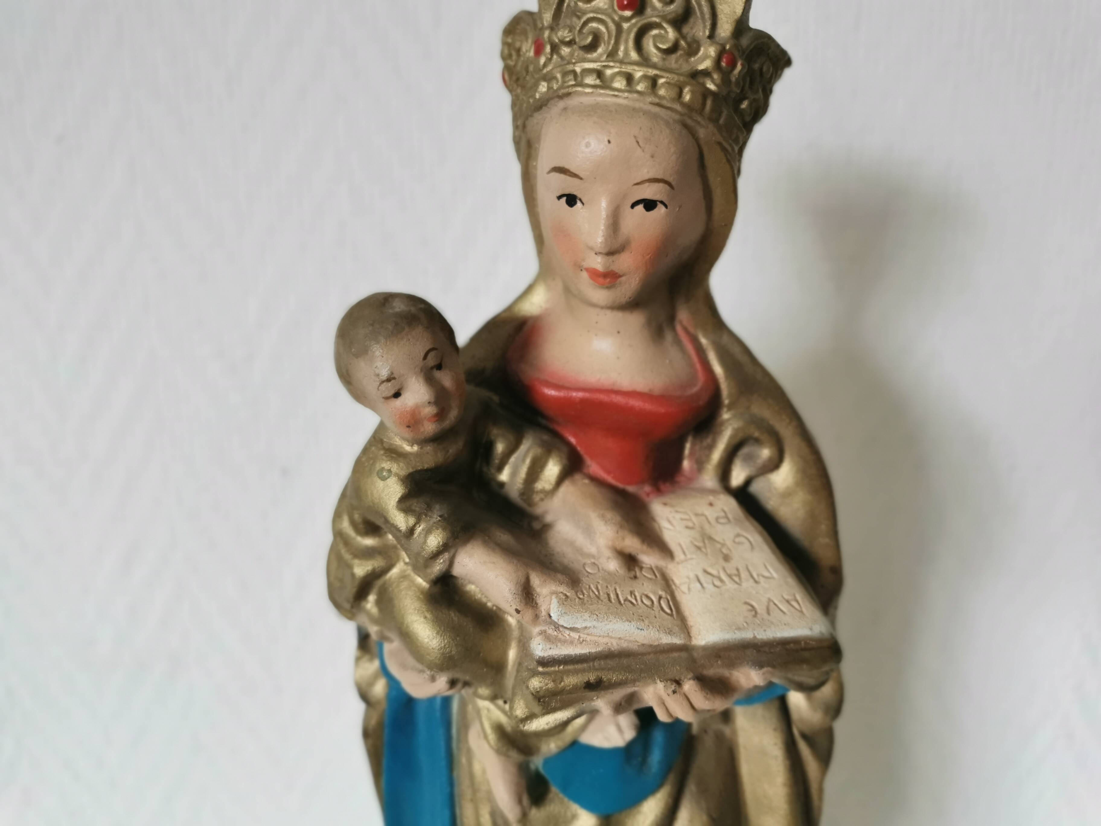 large statue of the Virgin and Child in painted plaster