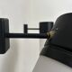 Pair of vintage adjustable wall lights, matte black metal and opaline glass, France 1950