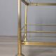 Vintage 1970s gold-plated metal and glass coffee table, designed by Allegri