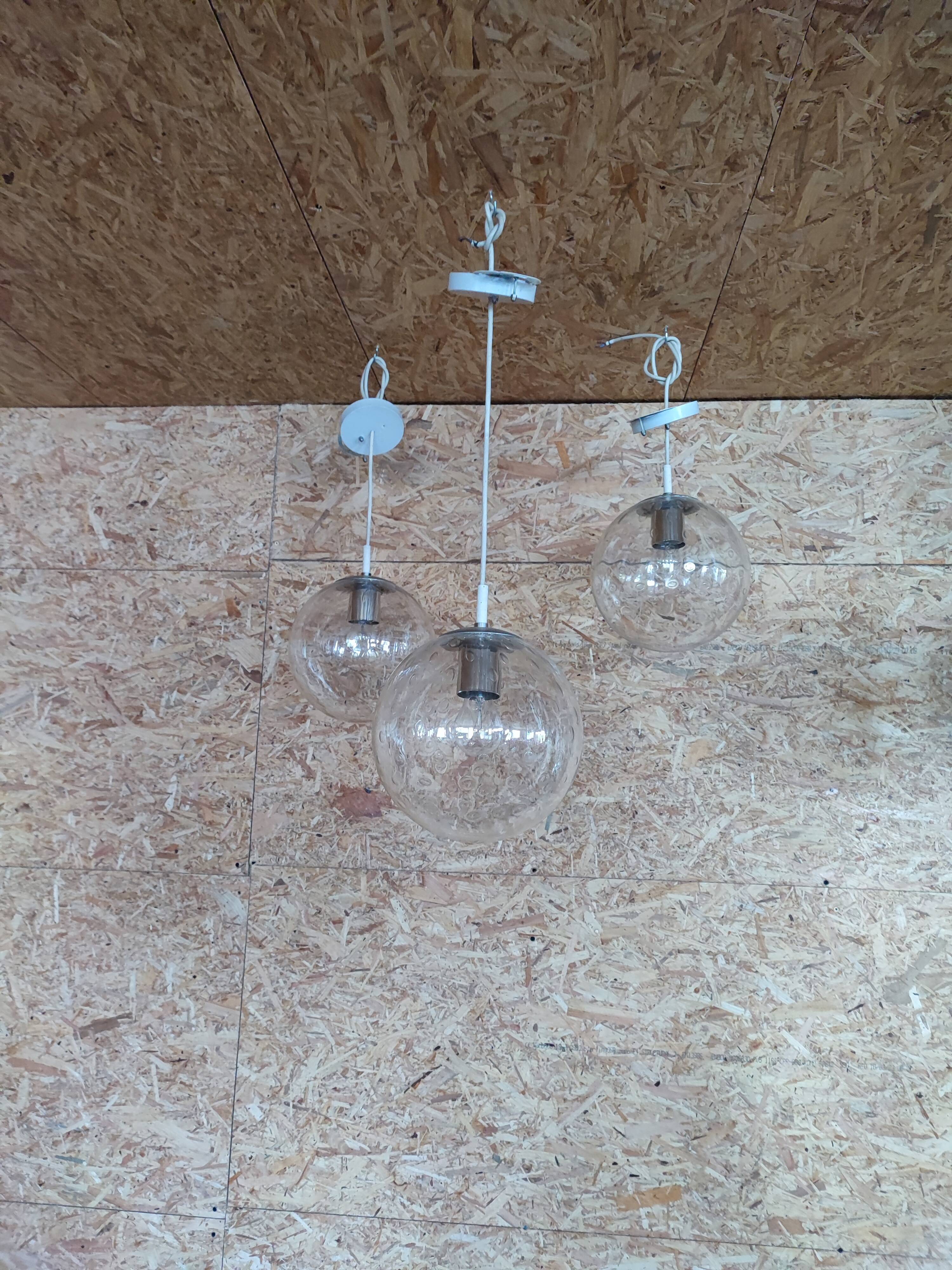 Bubbled glass globe pendant light. RAAK Amsterdam