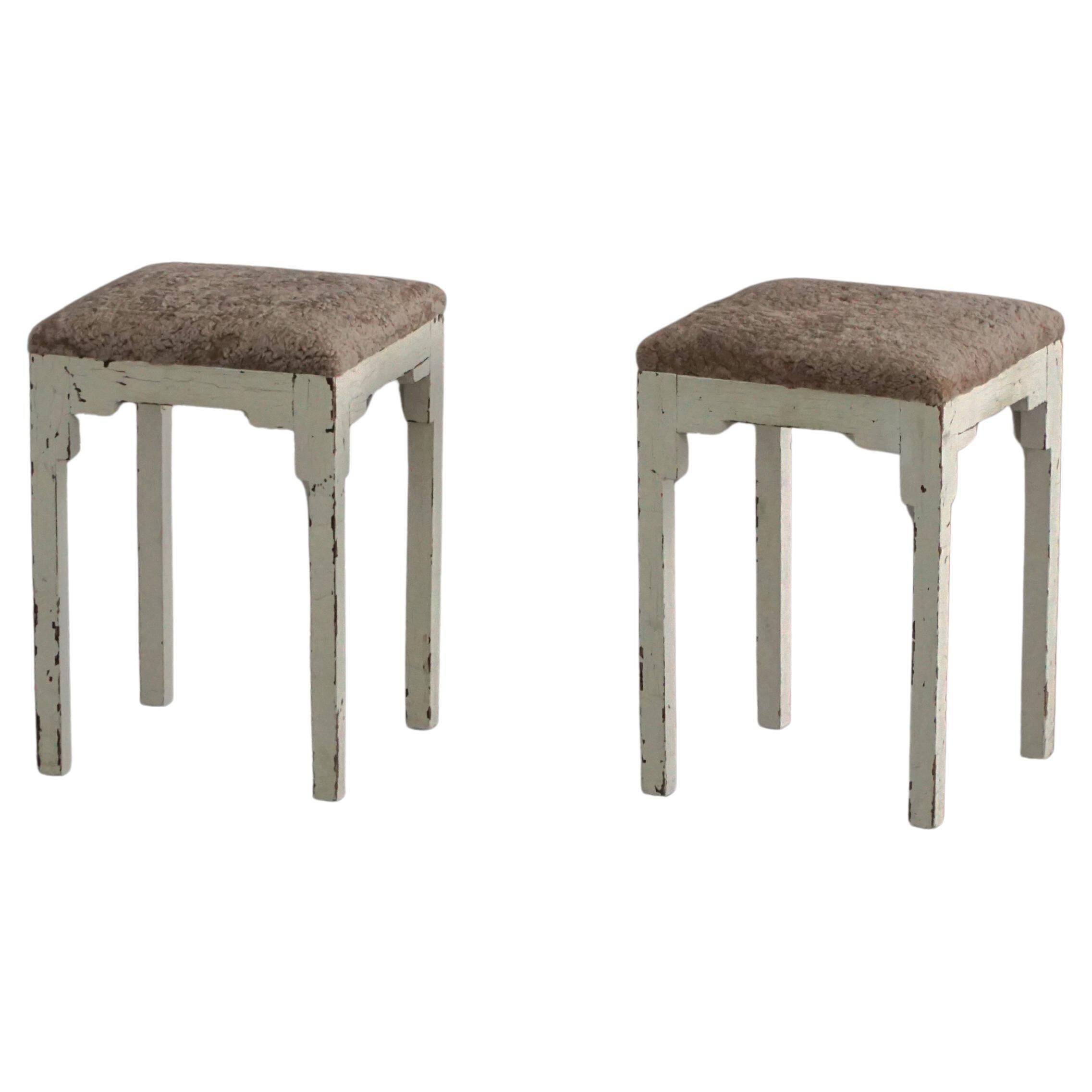 A pair of antique Danish stools, seats in lambswool, late 19th century.