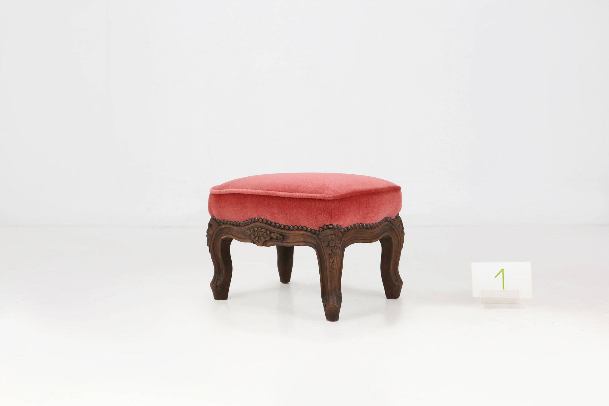 Baroque style foot stool in carved wood with coral velvet upholstery