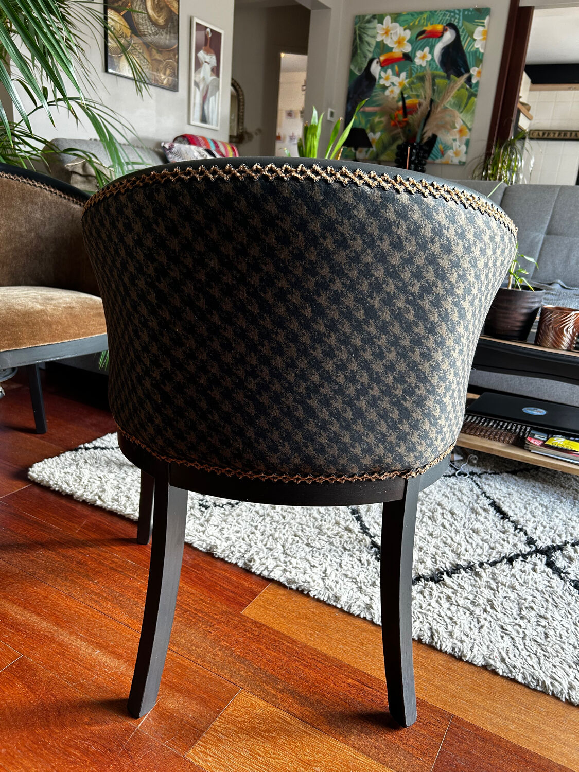 Pair of Art Deco barrel chairs in black and bronze