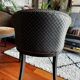 Pair of Art Deco barrel chairs in black and bronze