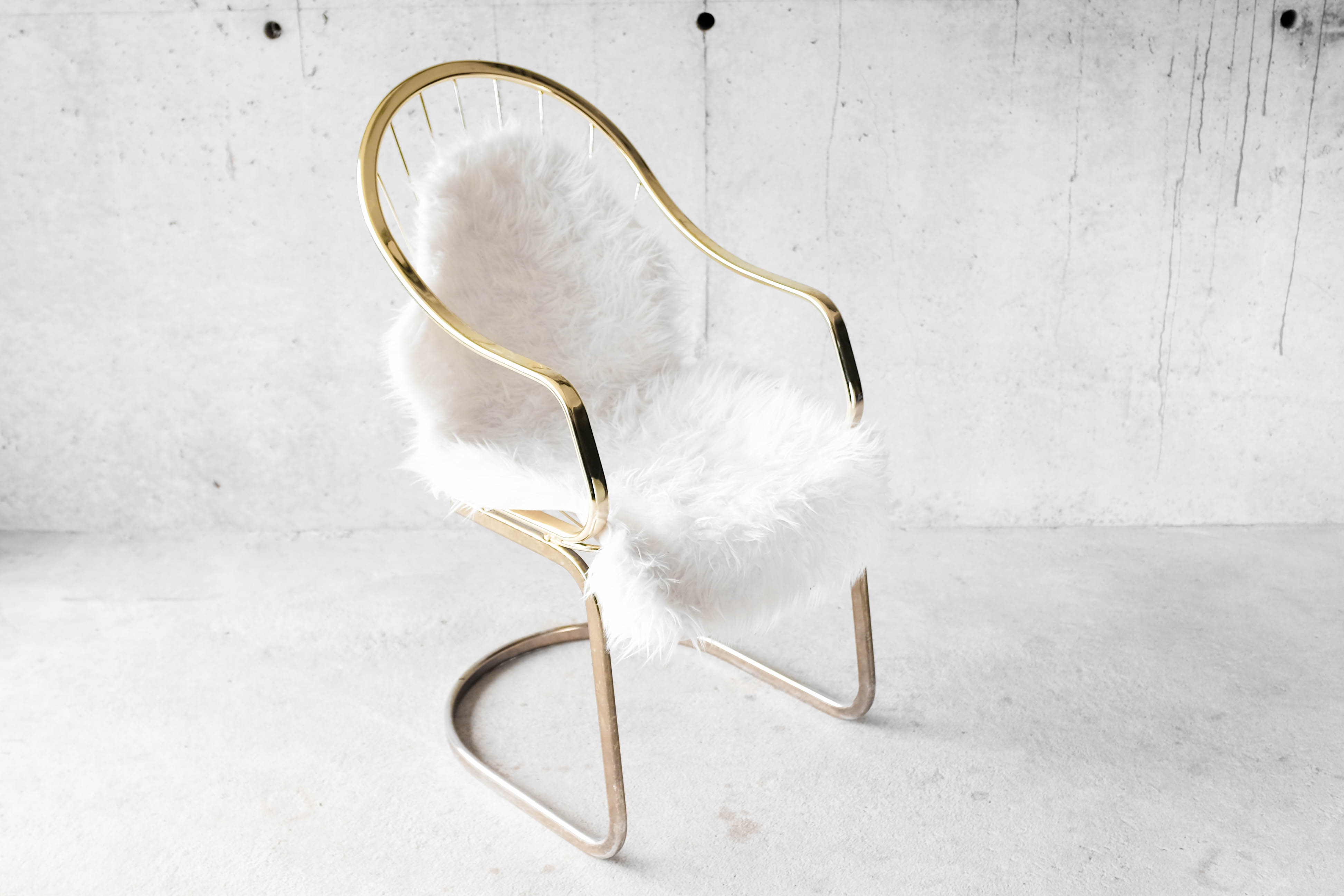 Golden metal armchair 70s