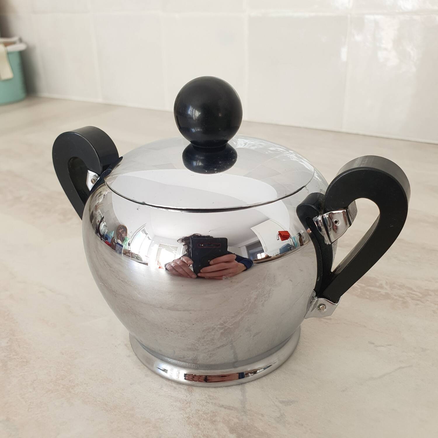 Alessi / Stainless steel and bakelite sugar bowl, "Bombé" collection