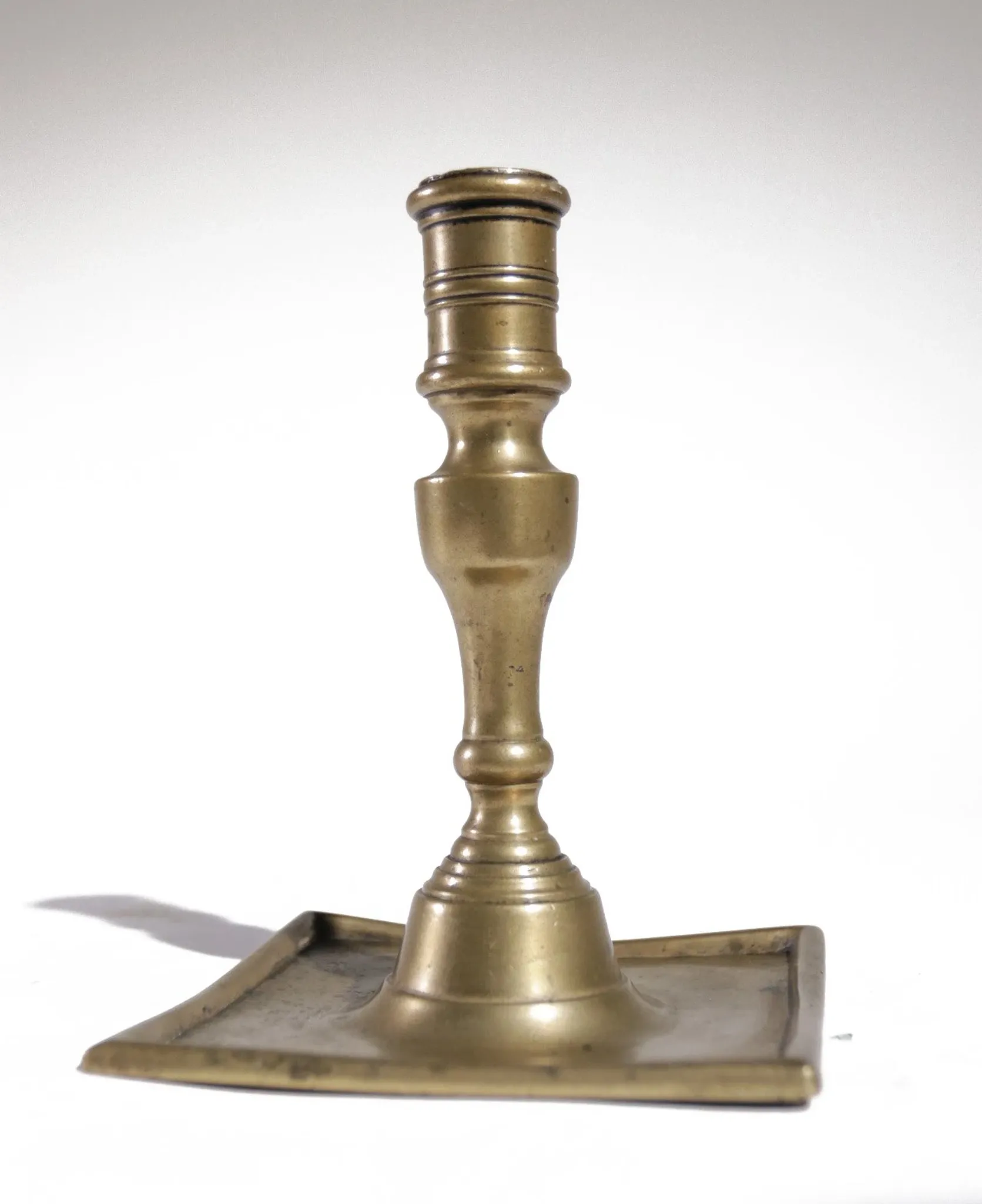 17th-century Spanish brass candlestick with square base