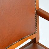 Ancien fauteuil en chêne et vinyle brutaliste