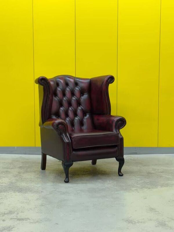 Fauteuil chesterfield en cuir bourgogne avec accoudoirs (Le prix est pour un)