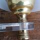 Golden metal appliques and plexiglass perspex in the style of Maison Lunel or Guariche.