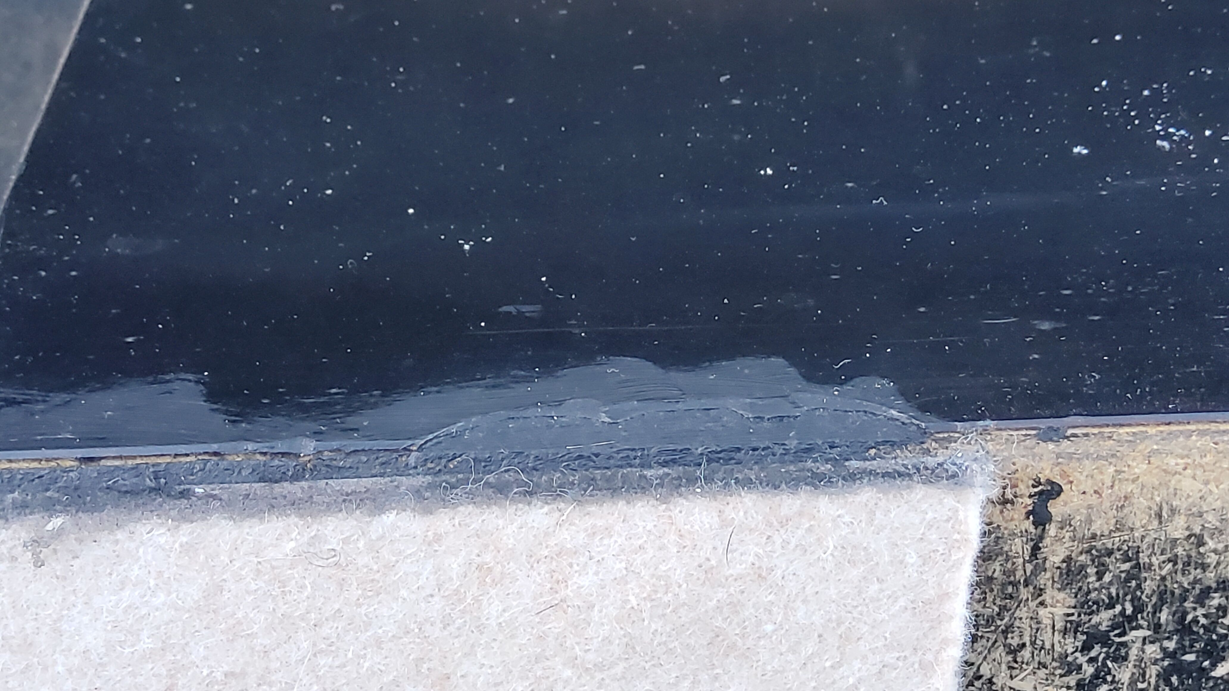 Coffee table in brushed steel and black tinted glass from the 70s
